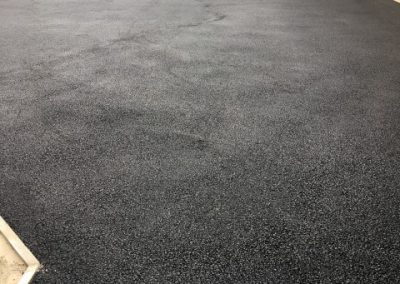 The tarmac driveway prior to having resin laid