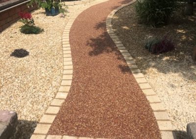New resin bound surface with complintary block paving edging